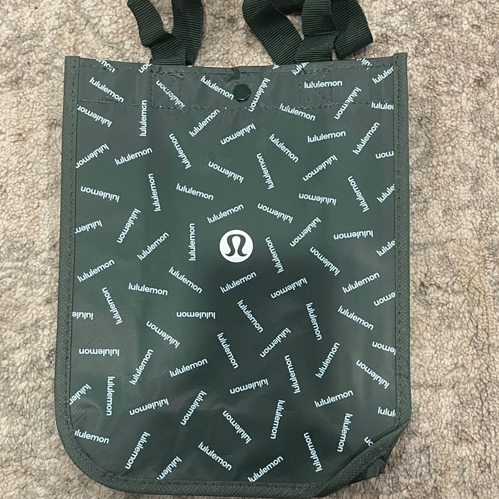 lululemon athletica Dark Green Logo Tote one left. Seasonal green
